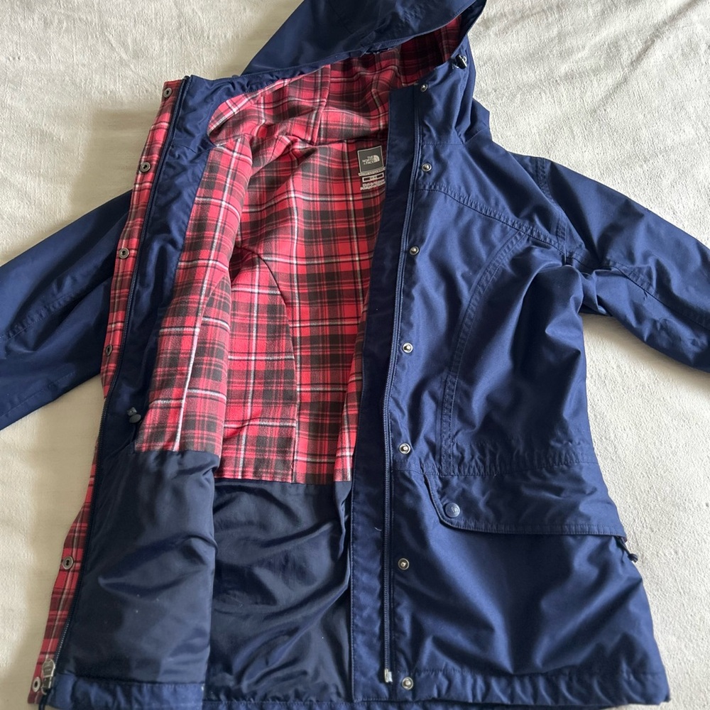 The North Face Blue Raincoat with Red Plaid Lining